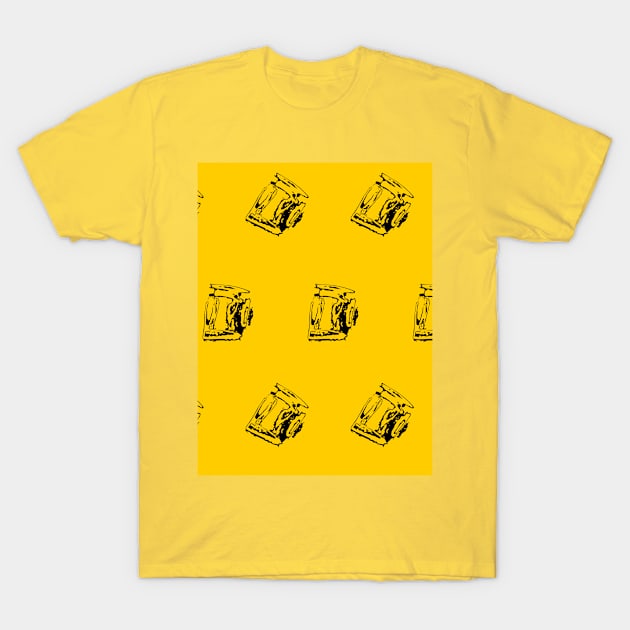 Black intricate fragments on a yellow surface. T-Shirt by grafinya